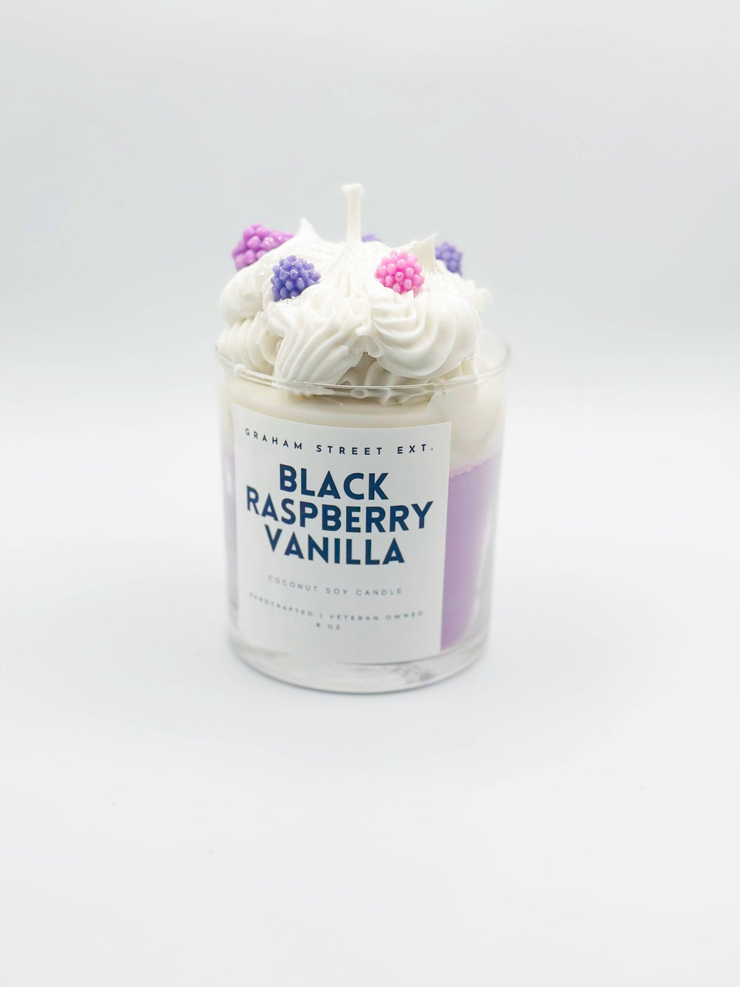 Vela de postre de vainilla y frambuesa negra